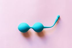 Blue kegel balls on pink background