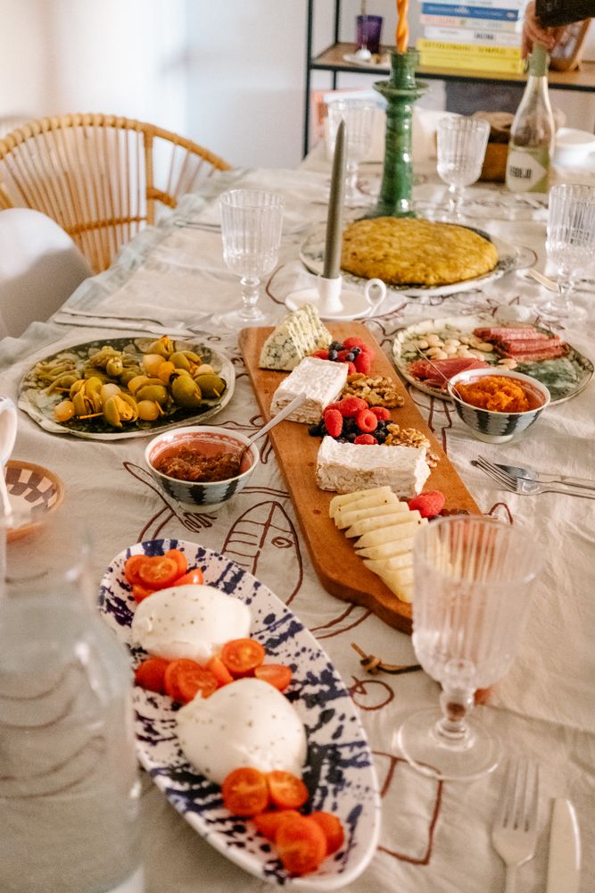 Cheese board and snacks set on table