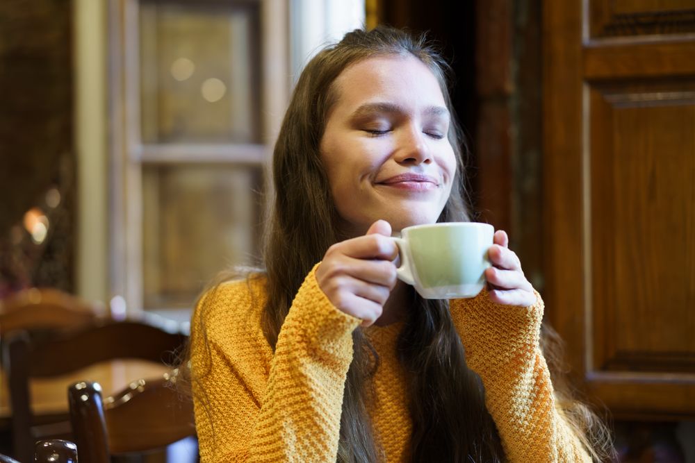 Savoring a Cozy Moment While Enjoying a Warm and Comforting Drink of Your Choice