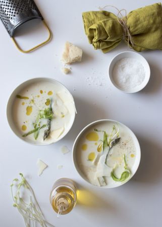 Kitchenware and condiments near asparagus cream soup