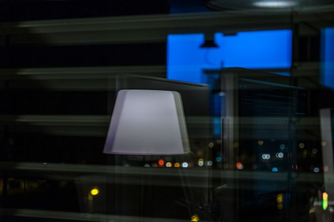 City lights reflected in office windows