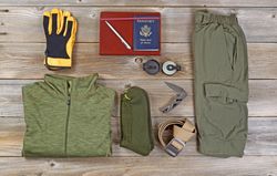 Clothing for hiking on rustic wood