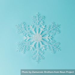 Single large snowflake on bright blue background 4N2x24