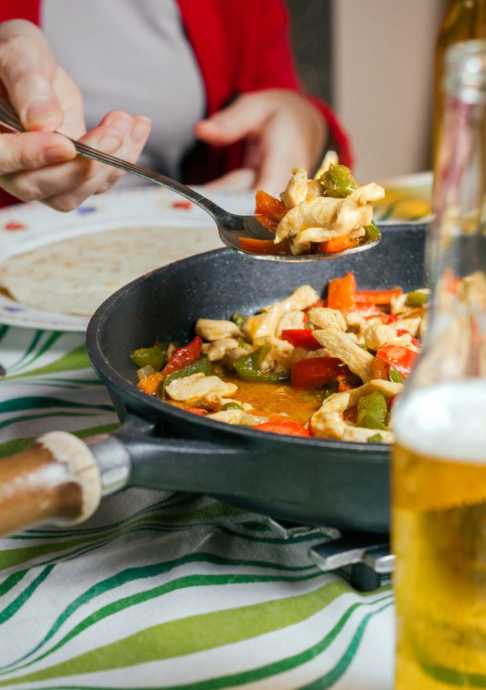Pan with mexican food on a table