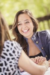 Female Laughing Sitting Outside