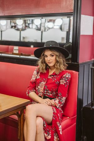 Elegant female sitting in cafe