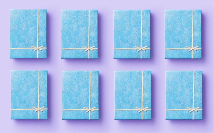 Blue gift boxes on purple background