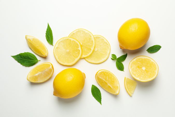Fresh lemons on light background, top view. Ripe fruit