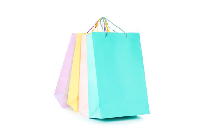 Multicolor paper bags isolated on blank background