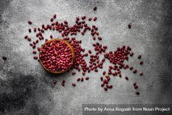 Top view of dried kidney beans spilling onto grey counter 47mxqr