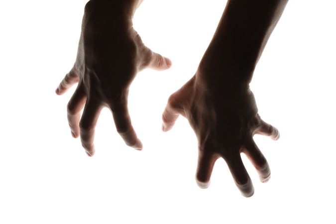 Scary human hands isolated on plain background