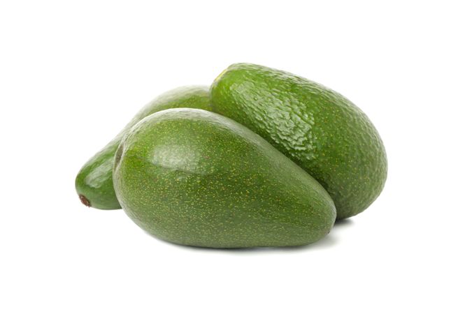 Ripe fresh avocado isolated on plain background