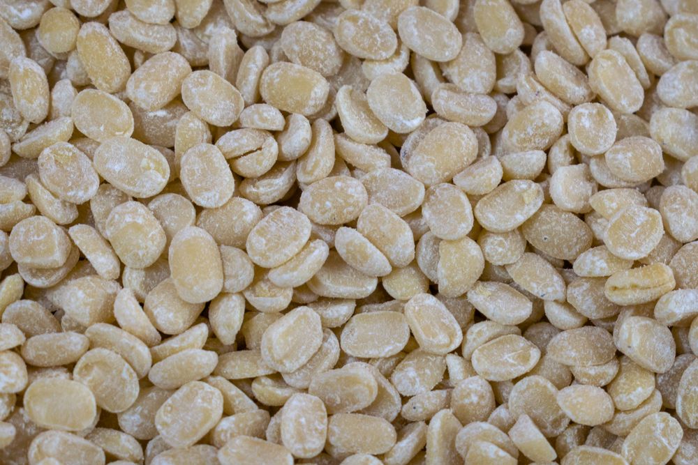 A background full of Split Gram also called Urad Dal