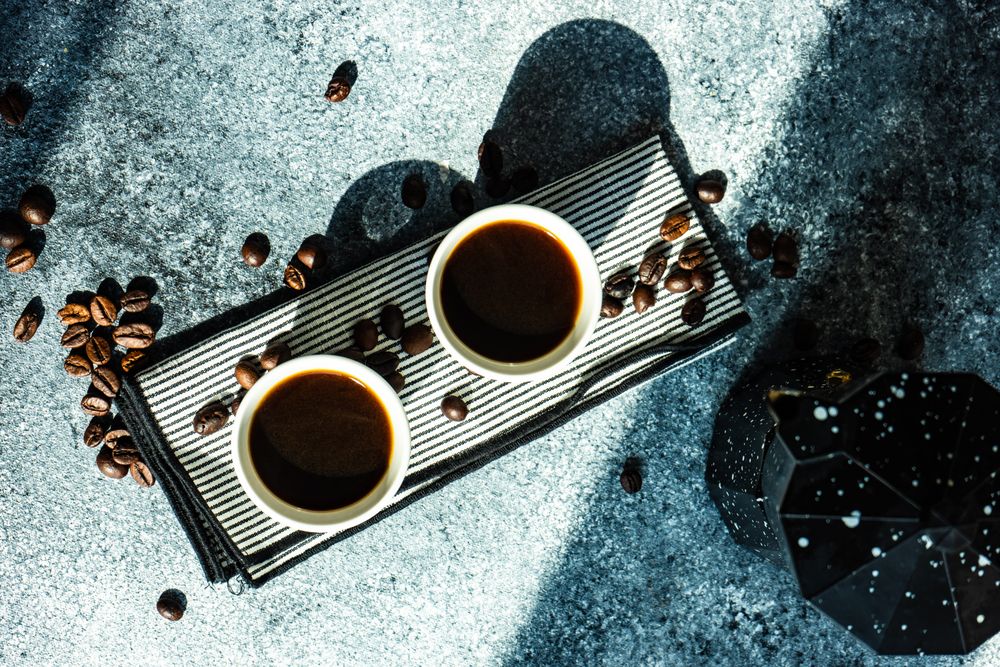 Cup of coffee on stone background