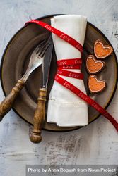 Red ribbon wrapped napkin for Valentine's Day table setting 4jVVxW