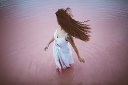 Woman enjoying sea breeze