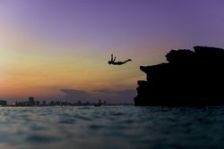 Person diving into water