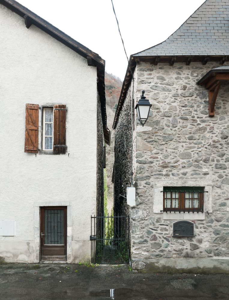 Old buildings in city near mountains