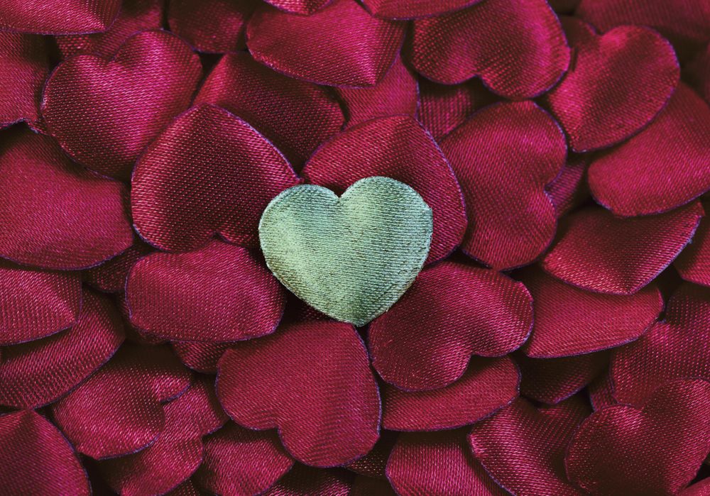 Valentine’s day background with gold and red hearts