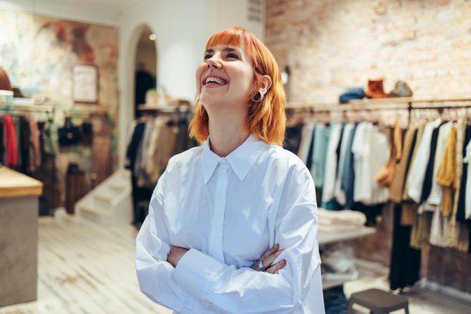 Successful woman standing in her store