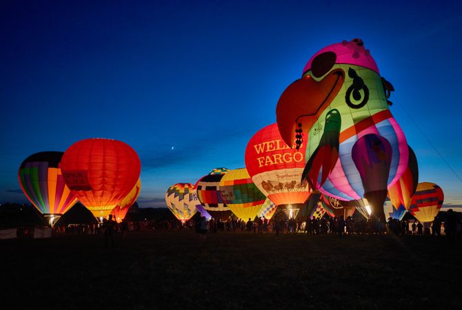Hot air balloons landing at night, Des Moines, Iowa
