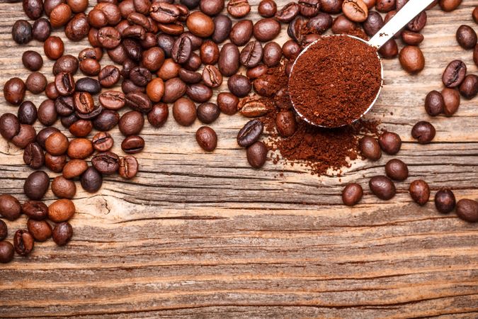 Coffee beans on wooden table