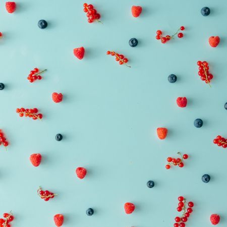 Berry fruit pattern on pastel blue background