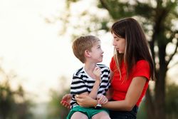 Affectionate mom with son outdoor