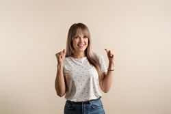 woman posing in pastel background
