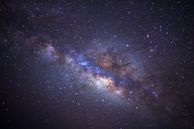 milky way galaxy with cloud and space dust in the universe, Long exposure photograph, with grain.