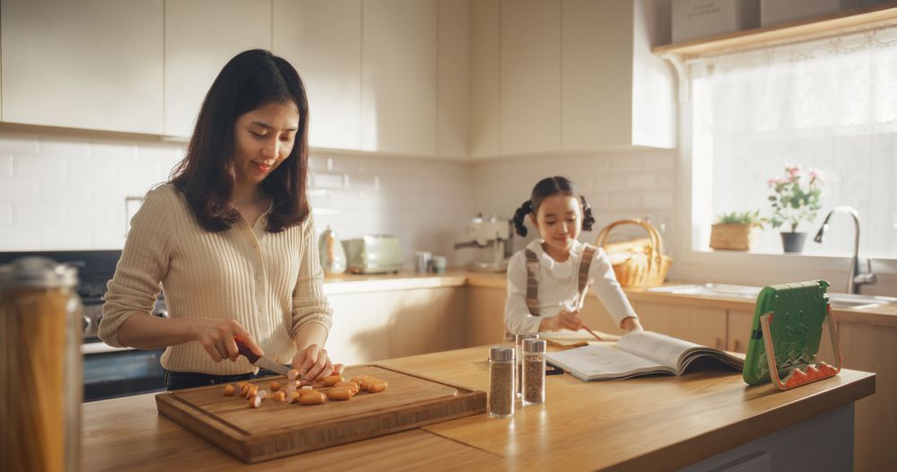 Portrait of a Korean Woman and her Daughter in the Kitchen at Home