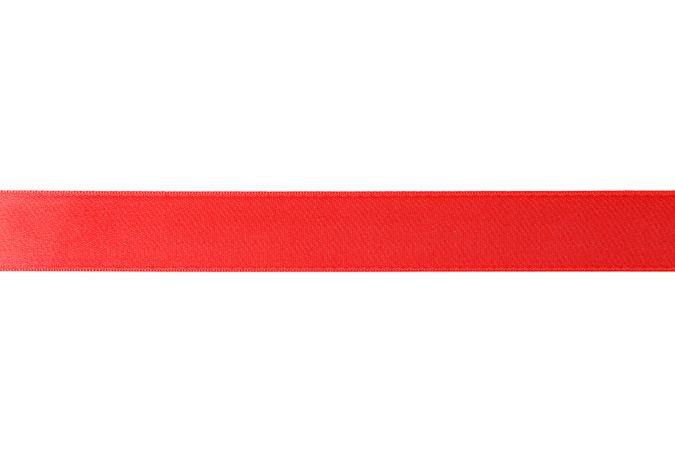 Red ribbon isolated on blank background. Gift concept