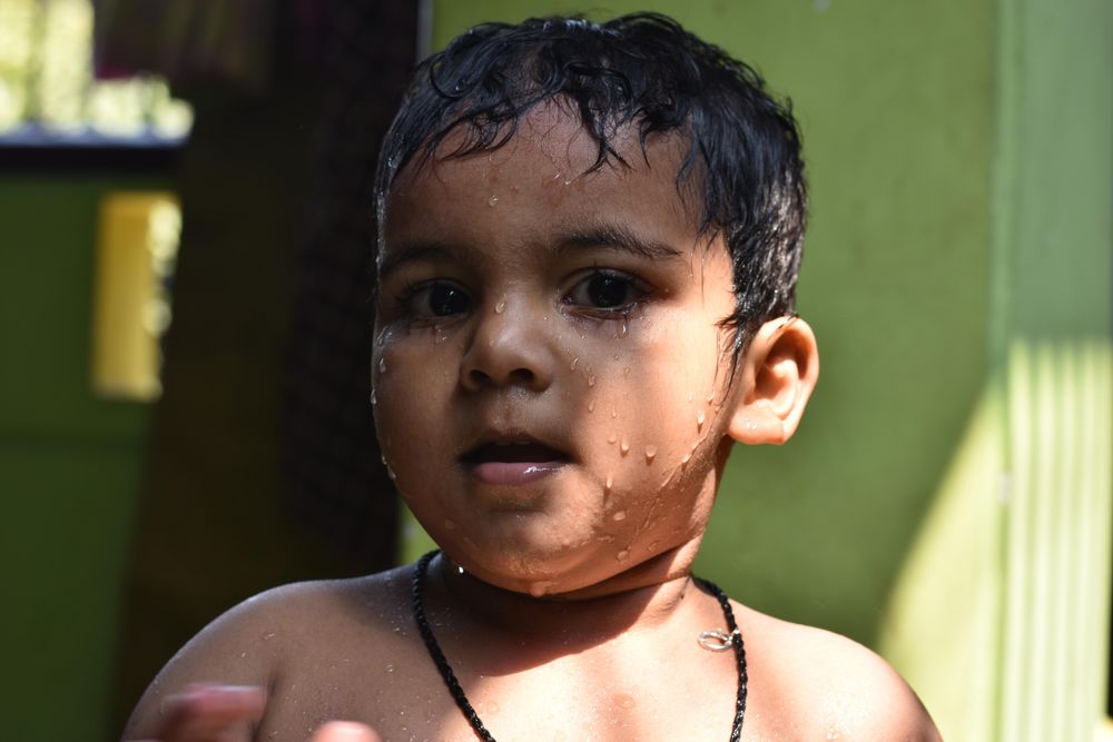 Portrait of a boy with wet hair