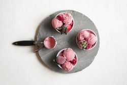 Scooped pink cream on a slab