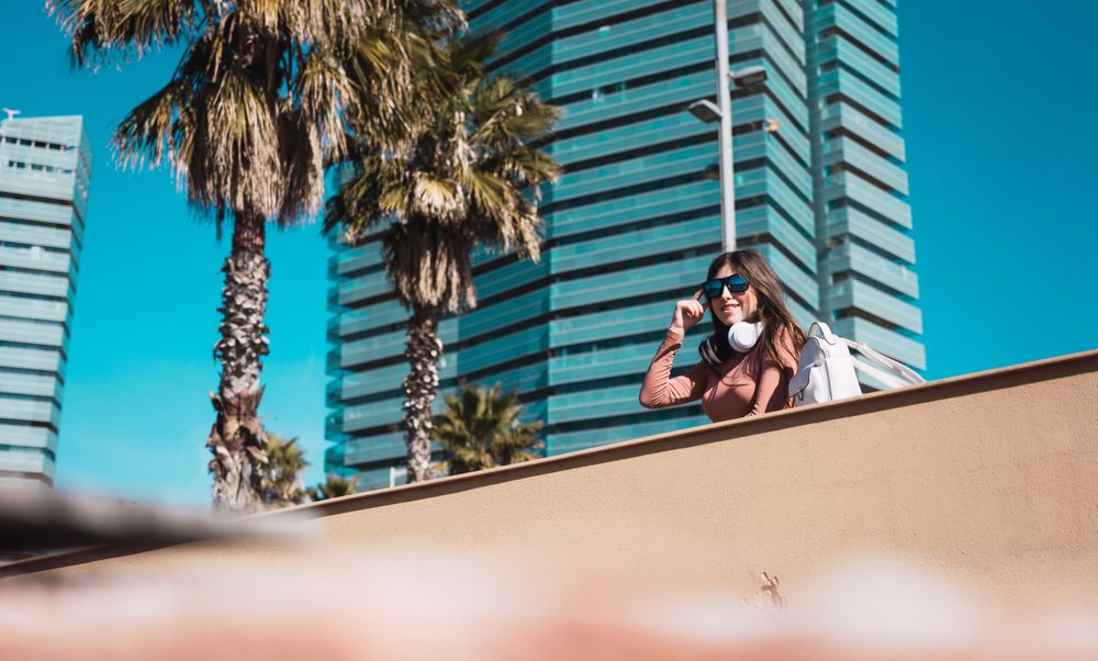 Teen girl watching the street while listening to music.