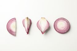Flat lay composition with red onion on neutral background