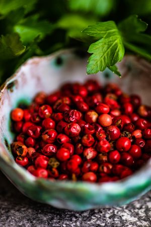 Close up of bowl of peppercorns