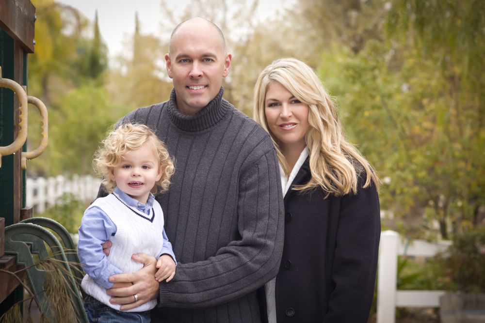 Young Family Portrait in Park