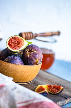 Traditionally healthy breakfast figs and honey on board with copy space