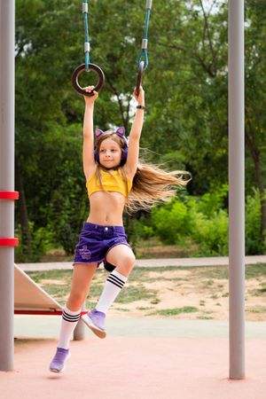 Schoolgirl on sports ground