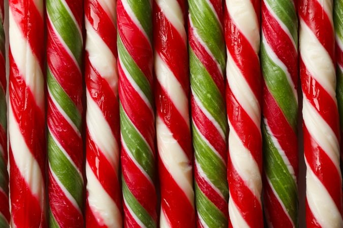 Candy canes texture on whole background, close up