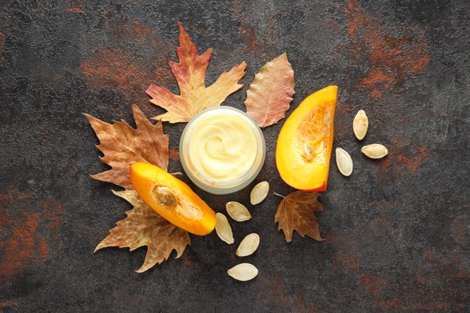 Skin care and face care concept - pumpkin cosmetic