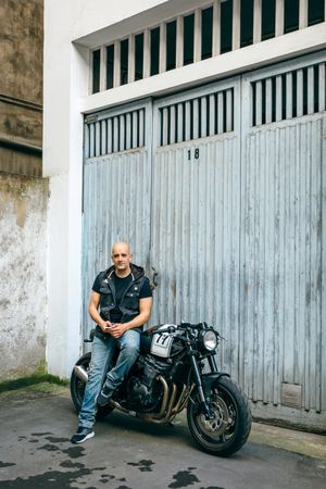 Biker posing with a motorcycle