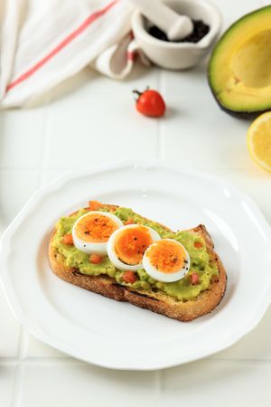 Sourdough Bread with Mashed Avocado and Sliced Boiled Egg