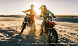 Two motocross bike riders on desert track 5X6Qvb