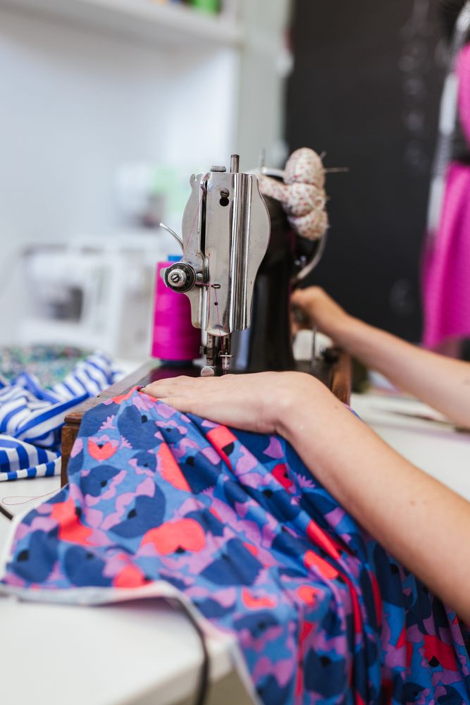 Woman in a sewing school