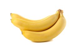Banana cluster isolated on light background. Fresh fruit