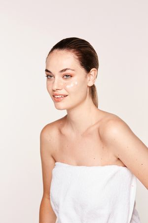 woman with cream on face