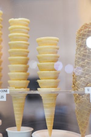 Stacks of different ice cream cones, vertical