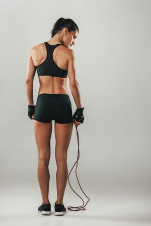 Fit healthy young athlete with a skipping rope